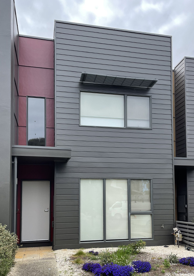 Grey weatherboard home with new paint by Seaview Painting Services in Geelong