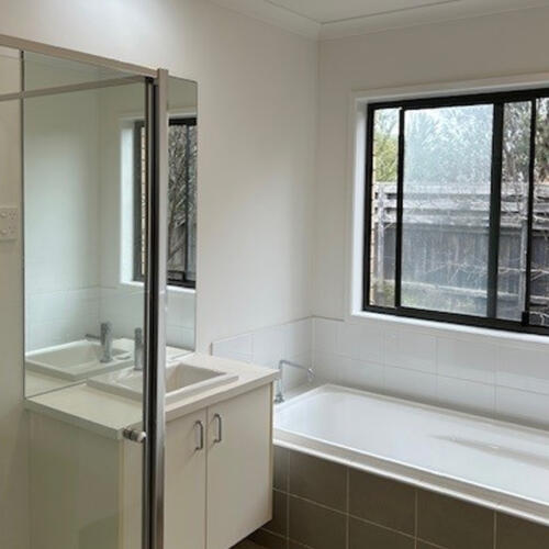 Bathroom repainted by Seaview Painting Services in Drysdale using Dulux Natural White