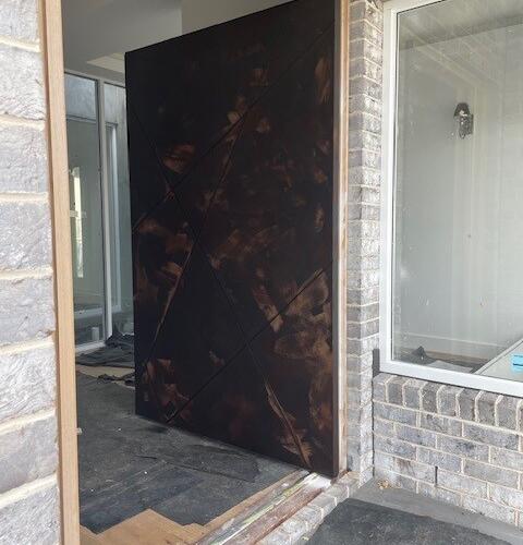 Front door painted with rust effect paint in Point Cook by Seaview Painting Services